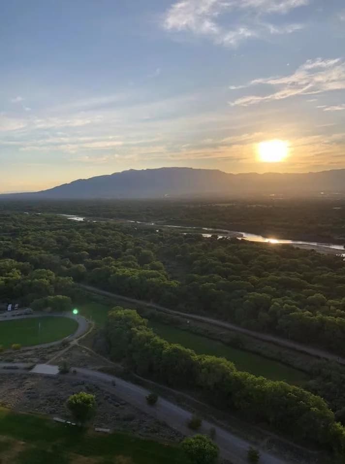 Sunrise over the Rio Grande and Albuquerque’s wooded valley from a balloon